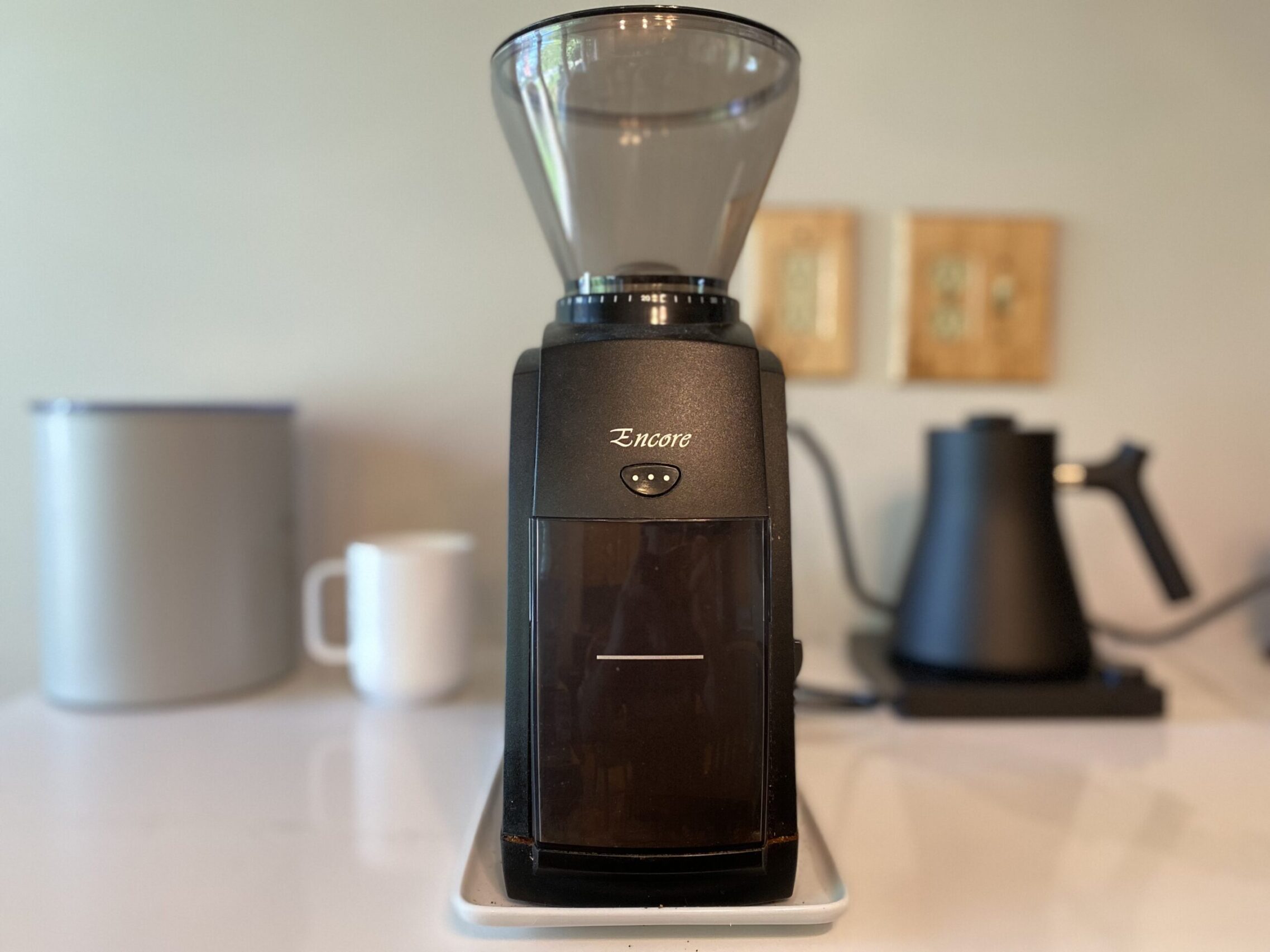 A coffee grinder sitting on the counter