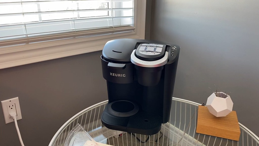 Keurig coffee machine sitting on table