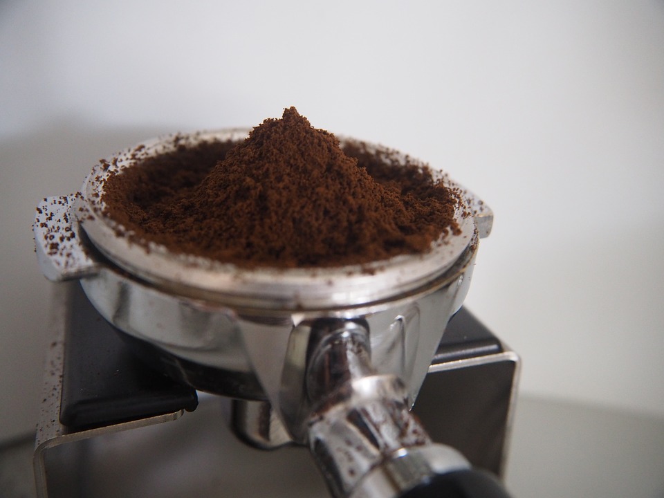 coffee-grinds-in-a-portafilter A heaping portafilter full of finely-ground coffee.